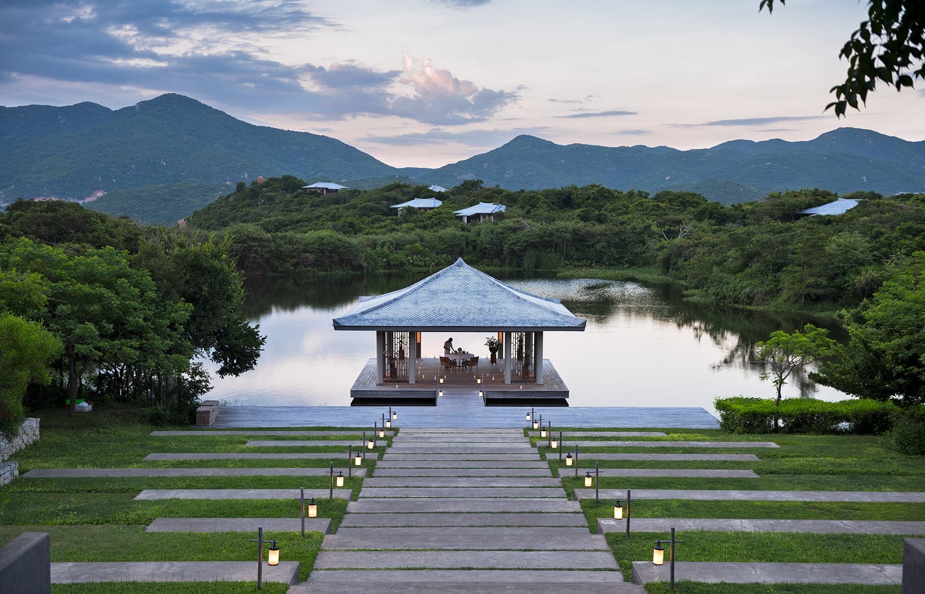 Amanoi Resort, Nha Trang, Vietnam. Luxury Hotel Review by TravelPlusStyle. Photo © Aman Resorts amanoi-vietnam-romantic-lake-dinner_original_15104