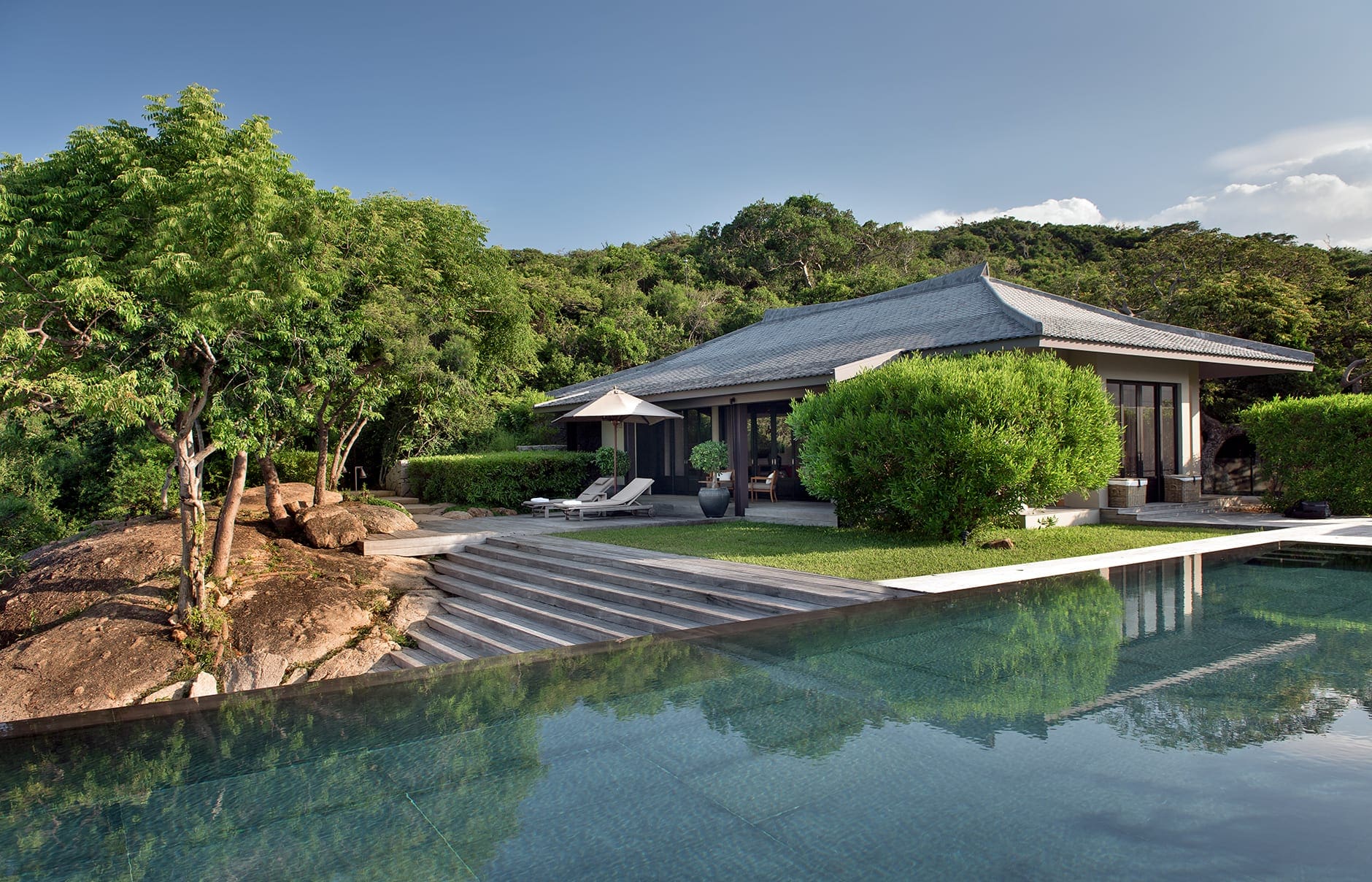 Amanoi Resort, Nha Trang, Vietnam. Luxury Hotel Review by TravelPlusStyle. Photo © Aman Resorts amanoi-vietnam-view-to-residence-9s-living-room-from-the-pool_original_15064