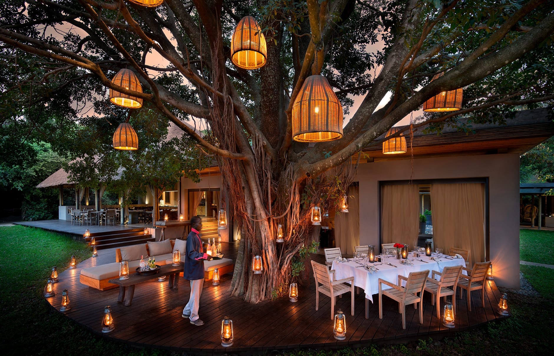 &Beyond Kichwa Tembo Tented Camp, Masai Mara, Kenya. Review by TravelPlusStyle. Photo © &Beyond dinner-with-lanterns-andbeyond-kichwa-tembo