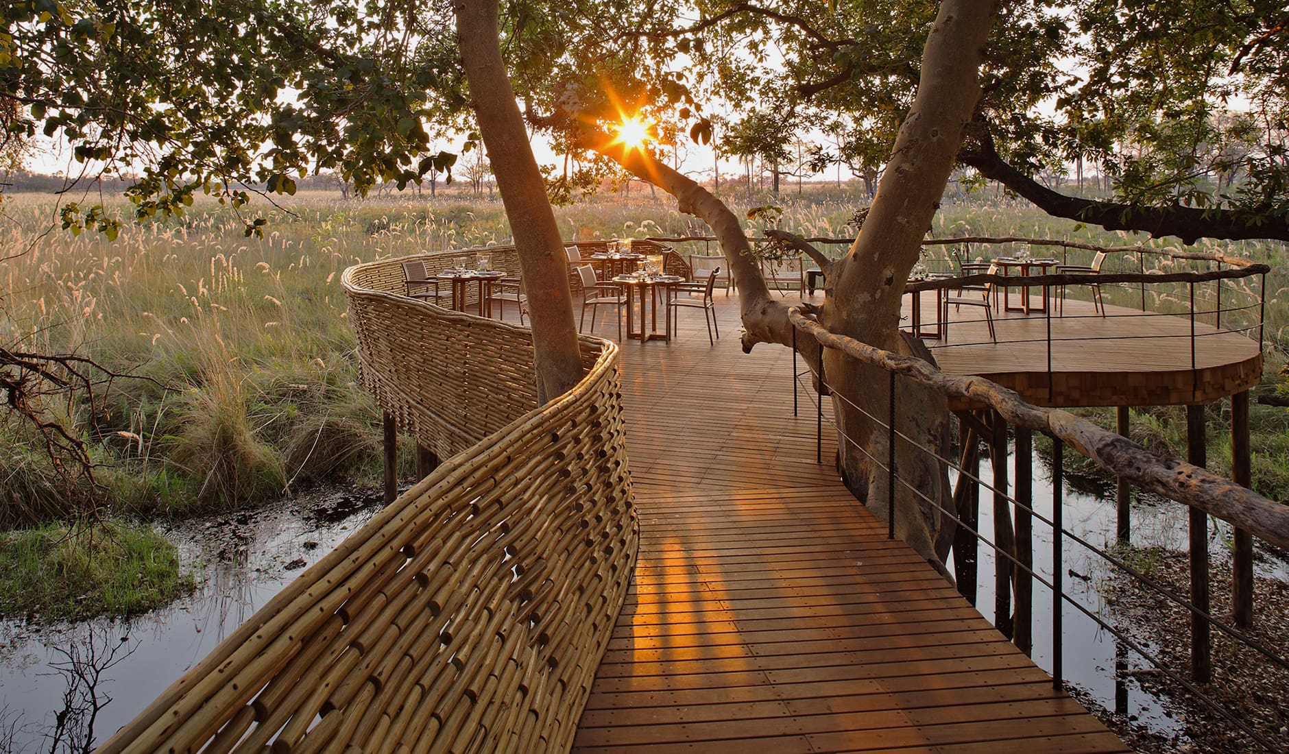 botswana-sandibe-guest-area-deck-with-sunset-view