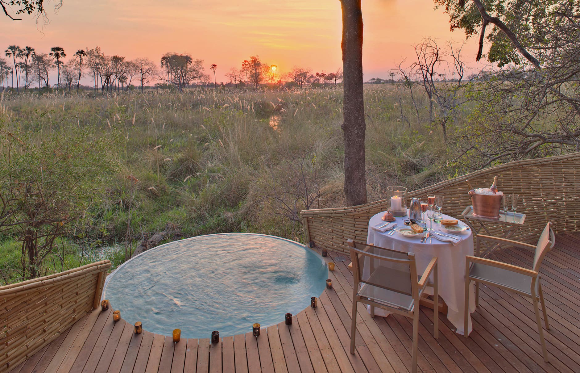 botswana-sandibe-suite-deck-romantic-dinner-at-sunset
