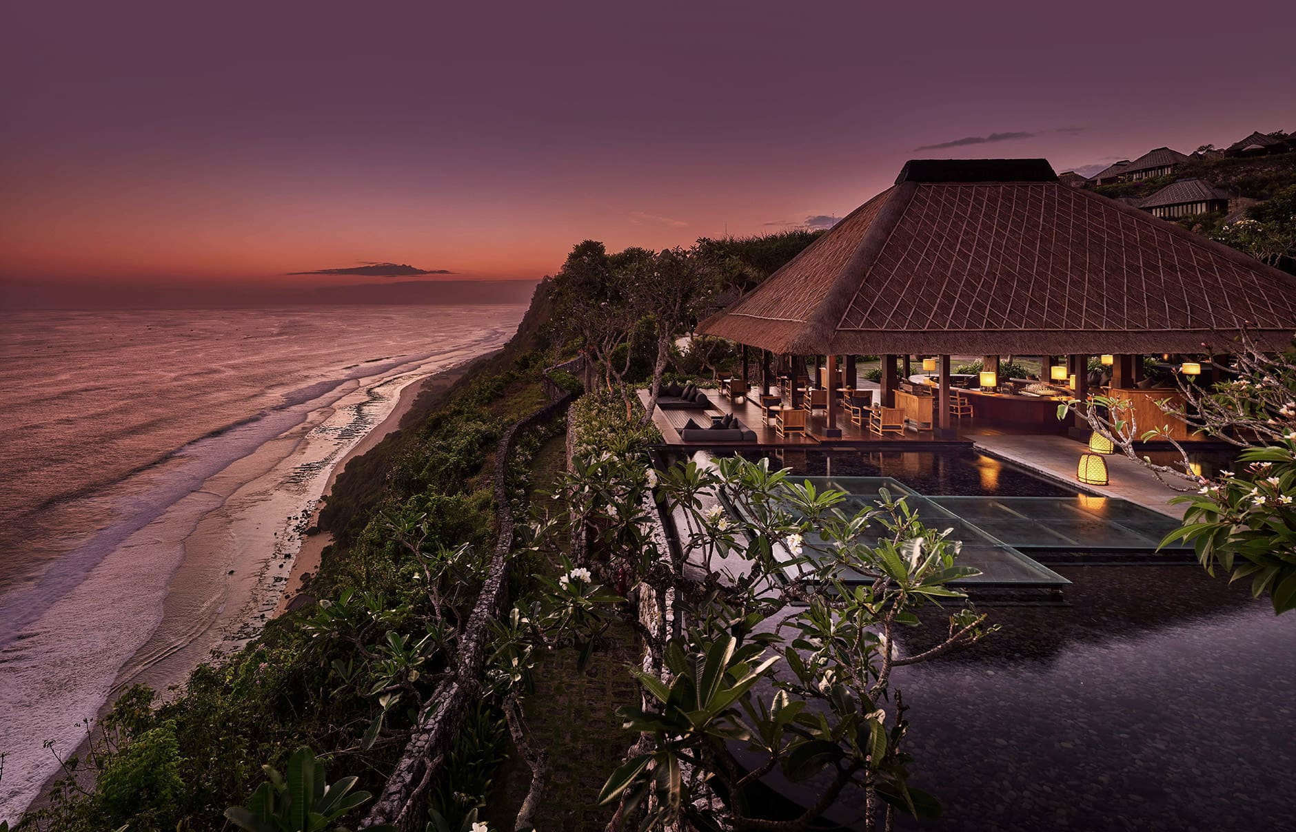 Bulgari Resort Bali, Uluwatu, Indonesia. Luxury Hotel Review by TravelPlusStyle. Photo © Bulgari Hotels & Resorts the-bvlgari-bar-cliff-at-sunset