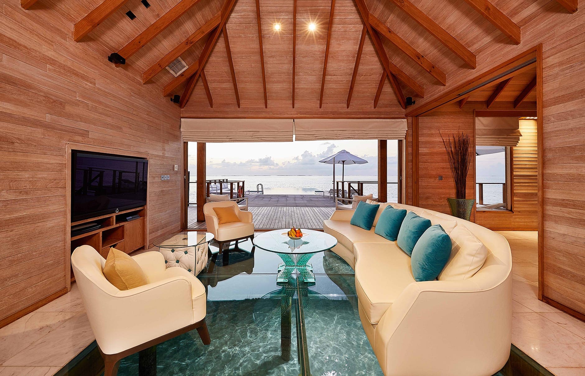 conrad-maldives-rangali-island-villas-sunset-water-villa-living-room-credit-justin-nicholas-hi-res-1-1