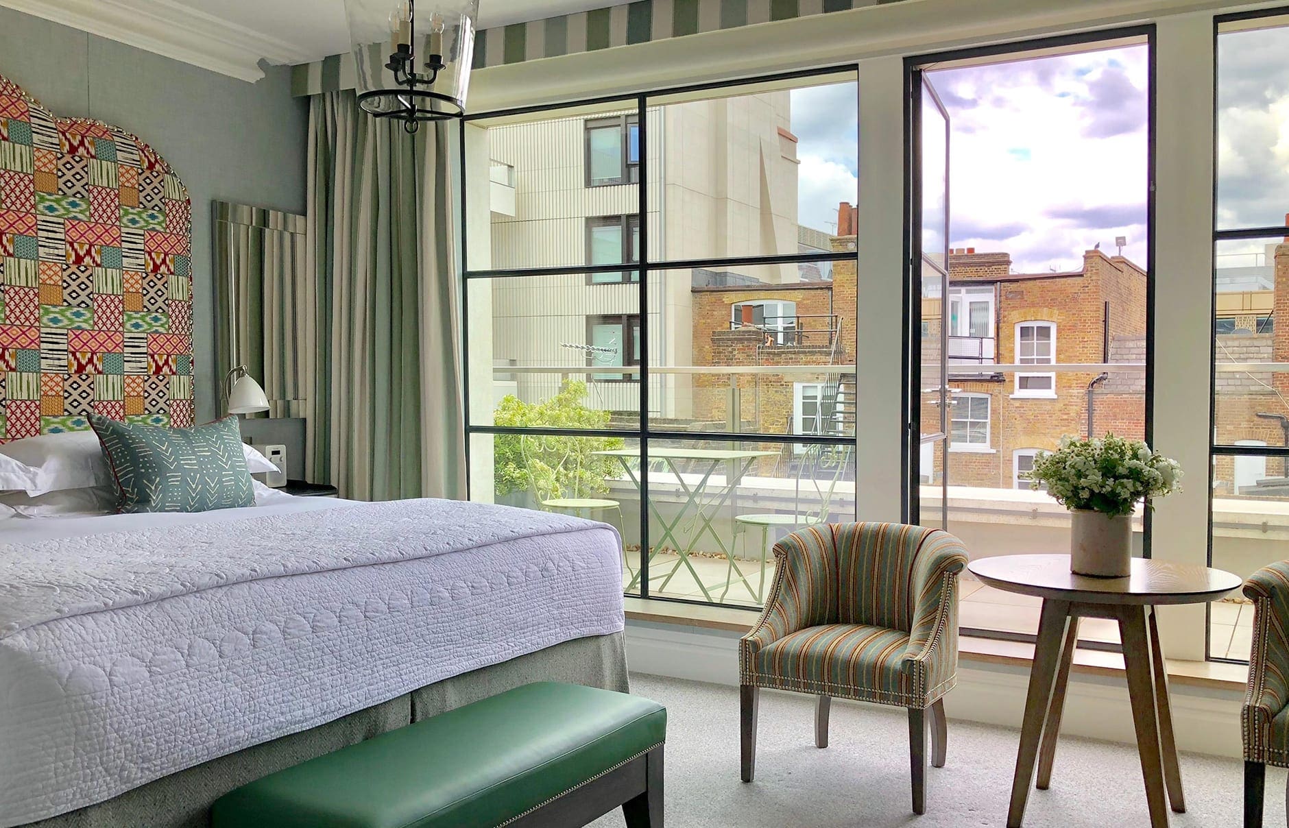 Ham Yard Hotel — Firmdale Hotels, London, UK. Luxury Hotel Review by TravelPlusStyle. Photo © Firmdale Hotels ham-yard-hotel-luxury-room-with-balcony-r-r2