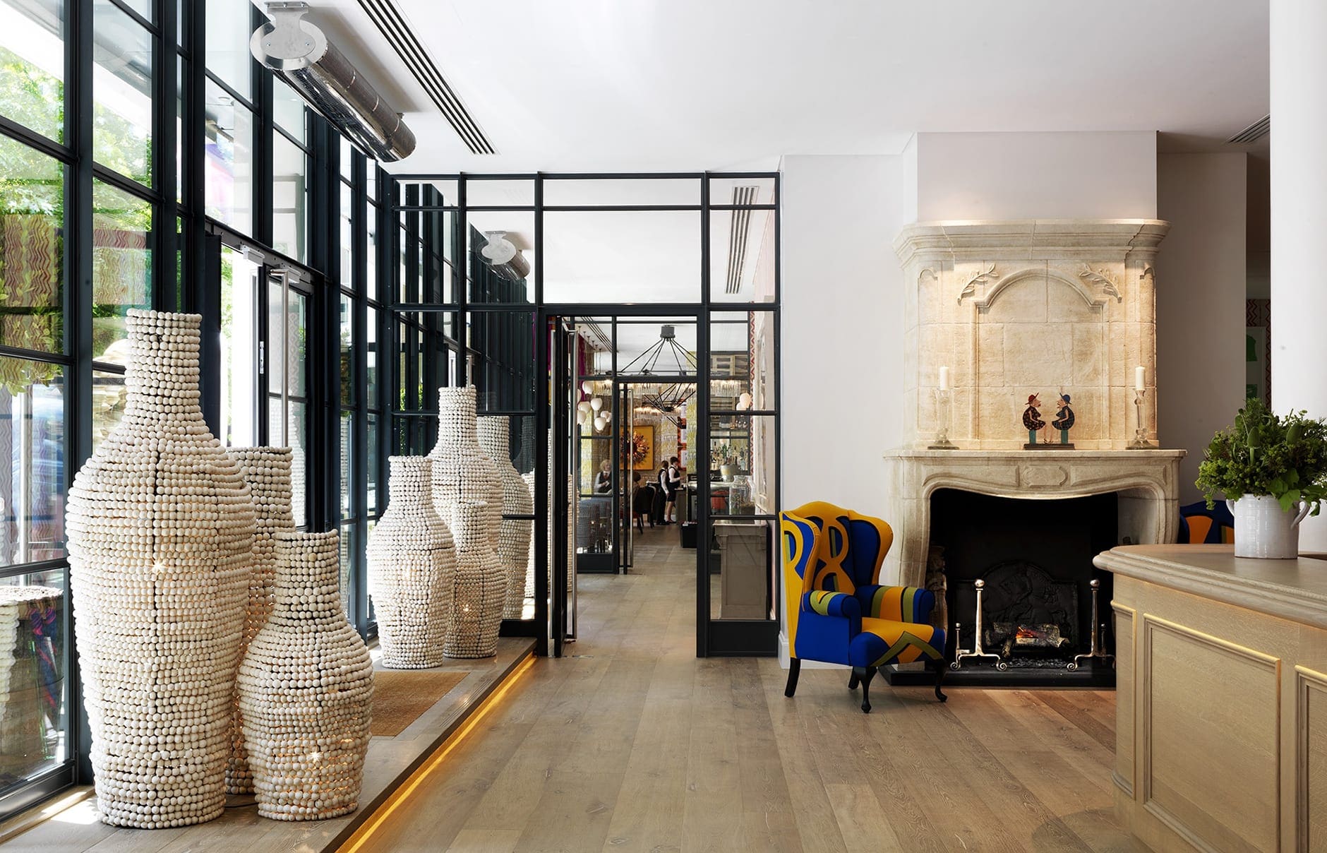 Ham Yard Hotel — Firmdale Hotels, London, UK. Luxury Hotel Review by TravelPlusStyle. Photo © Firmdale Hotels hyh-lobby-to-restaurant-v2-lr