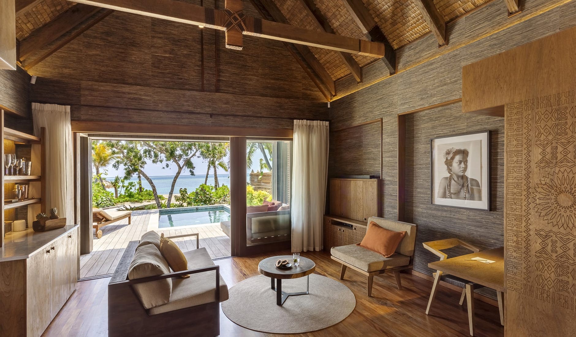 Six Senses Fiji, Fiji. TravelPlusStyle.com living_area_in_beachfront_pool_villa_7211-a4