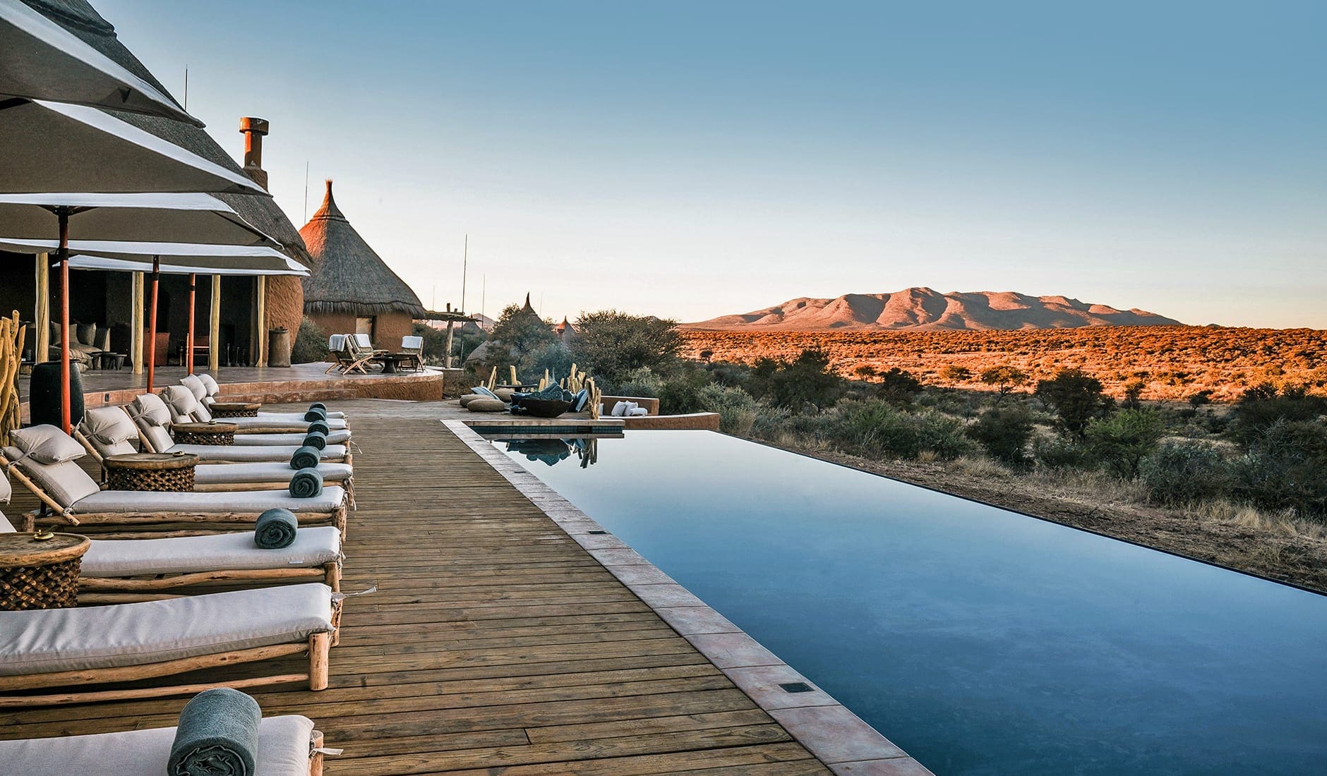 Omaanda, Namibia. TravelPlusStyle.com omaanda_2019_omaanda-pool-side-2-zannier-hotels