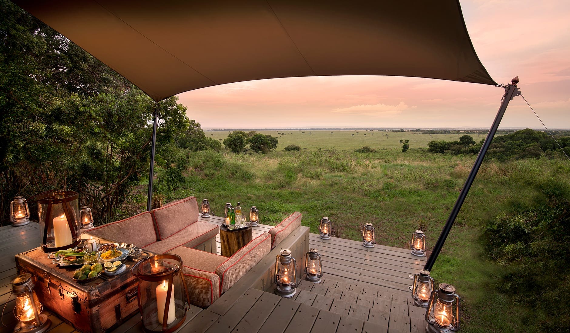 &Beyond Bateleur Camp, Masai Mara, Kenya. TravelPlusStyle.com sundowners-from-your-suite-andbeyond-bateleur-camp