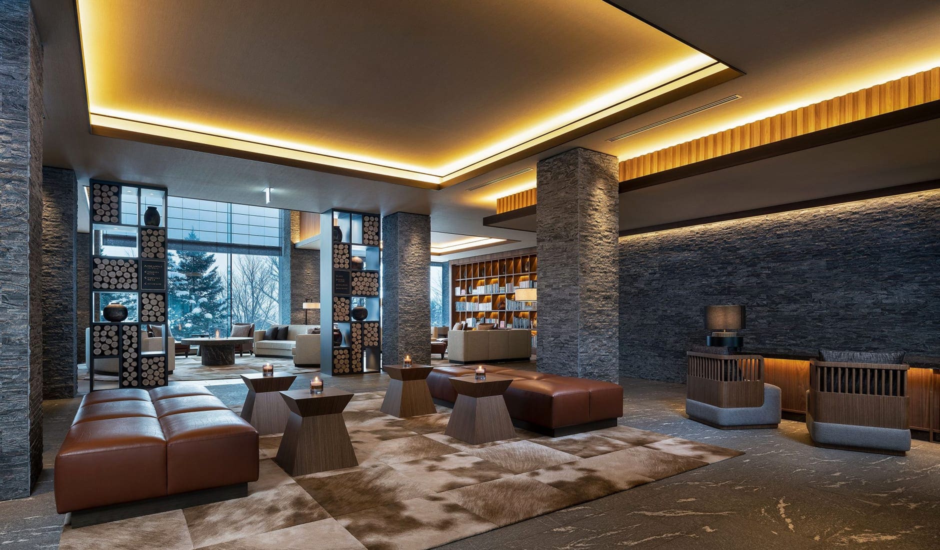Hotel Higashiyama Niseko Village, a Ritz-Carlton Reserve. TravelPlusStyle.com higashiyama-niseko-village-a-ritz-carlton-reserve-lobby-scaled