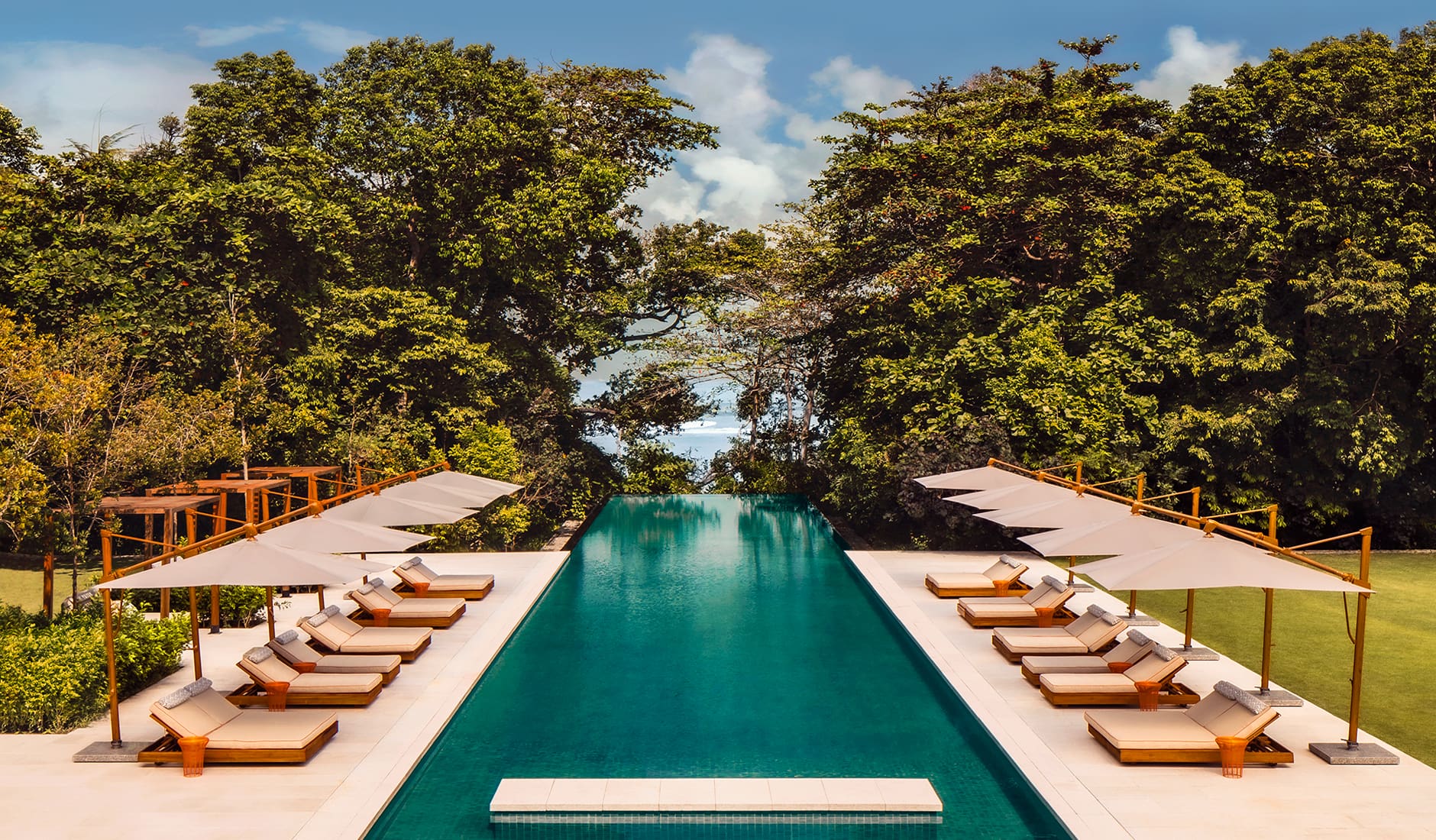 One&Only Desaru Coast, Malaysia. The Top 100 Luxury Hotel Openings of 2020 by TravelPlusStyle.com oo_dc_main_pool_wide-0450_master