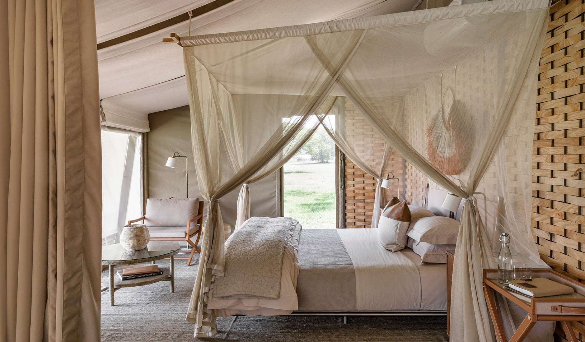 Singita Sabora Tented Camp, Tanzania. TravelPlusStyle.com singita-sabora-tented-suite-inspiracja-bedroom-scaled