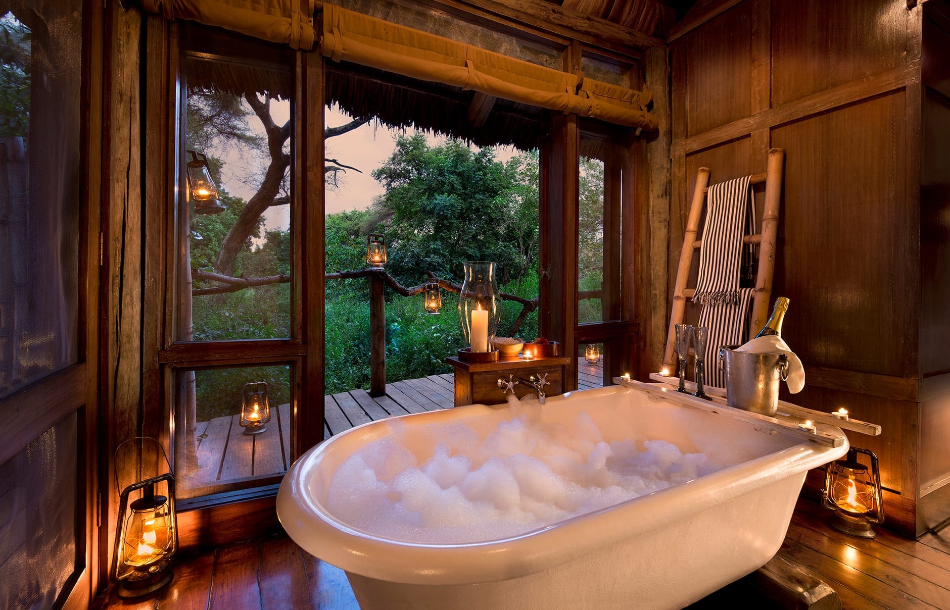 andBeyond Lake Manyara Tree Lodge, Tanzania. Hotel Review by TravelPlusStyle. Photo © &Beyond treehouse-suite-bathroom-andbeyond-lake-manyara-tree-lodge