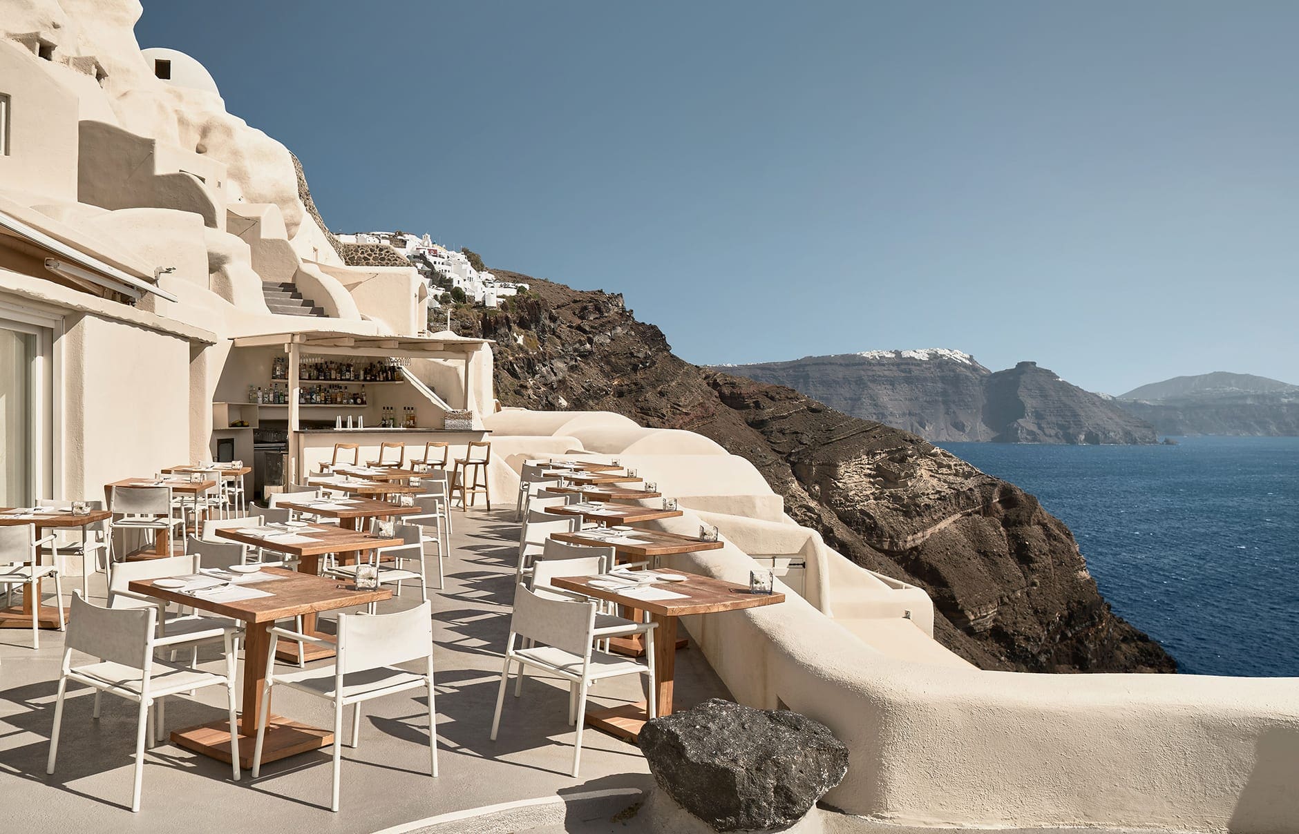 Mystique, Santorini, Greece. Hotel Review by TravelPlusStyle. Photo © Marriott International 103747129-h1-jtrml-charisma-restaurant-4478-hor-clsc