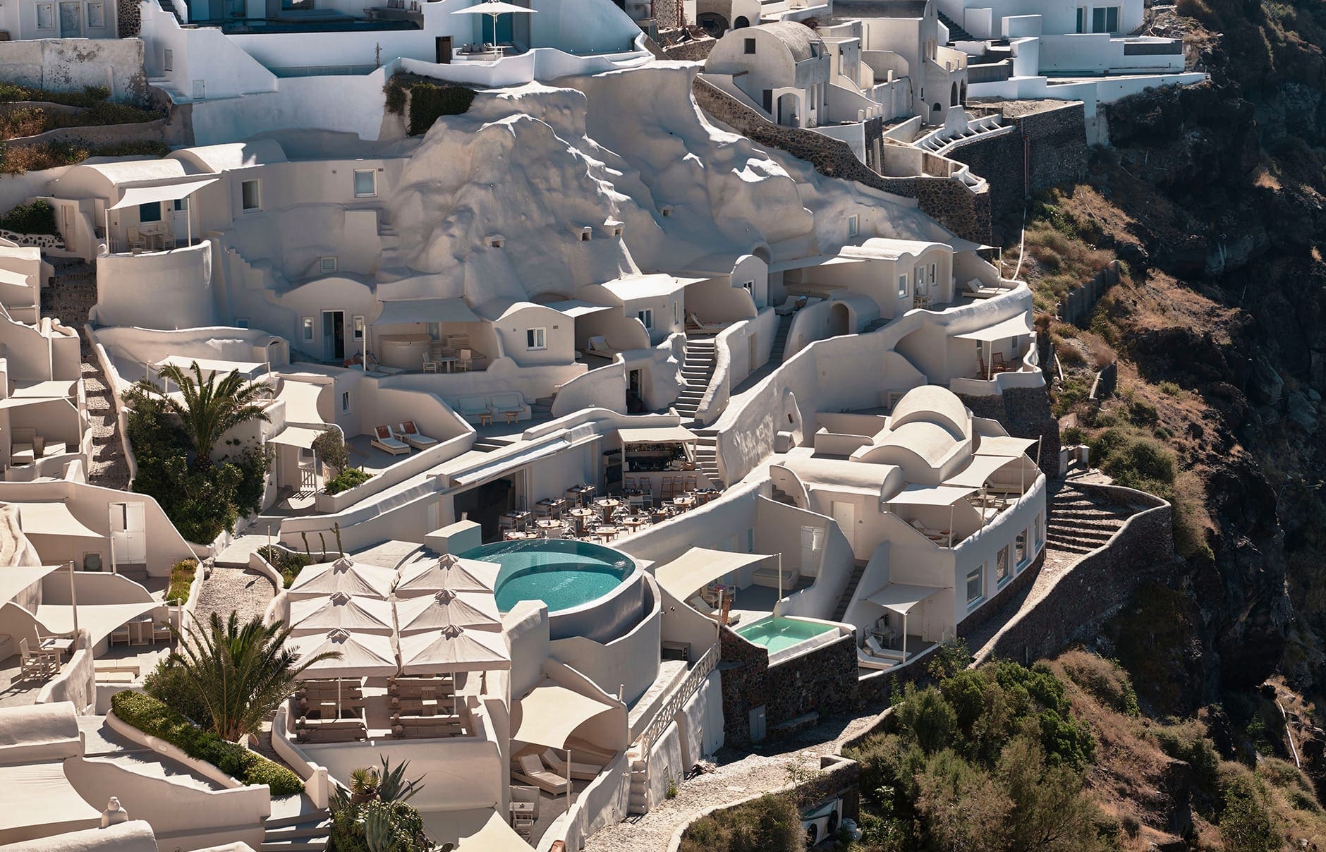 Mystique, Santorini, Greece. Hotel Review by TravelPlusStyle. Photo © Marriott International 117130086-h1-jtrml-exterior-4801-hor-clsc