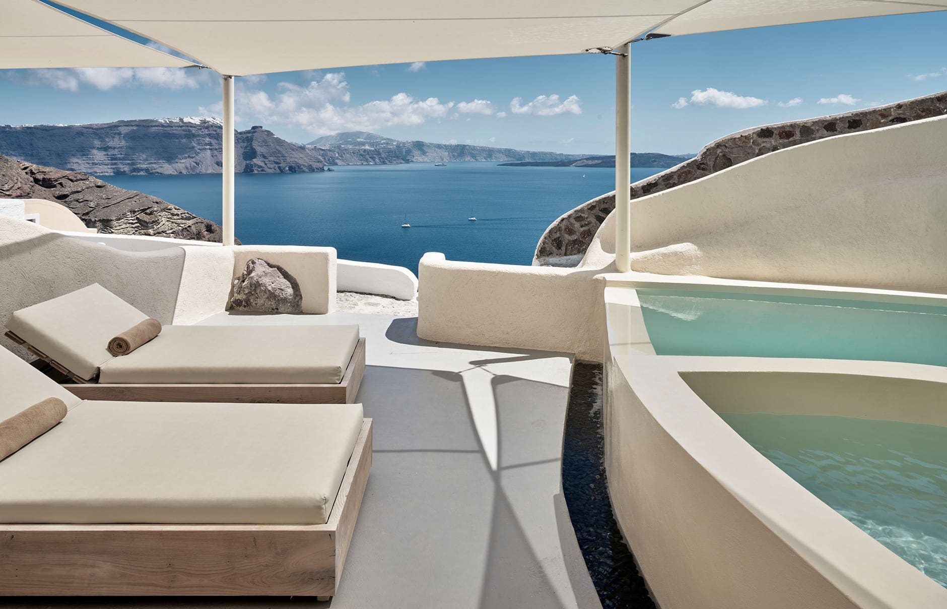 Mystique, Santorini, Greece. Hotel Review by TravelPlusStyle. Photo © Marriott International 117130356-h1-jtrml-mystery-villa-4789-hor-clsc