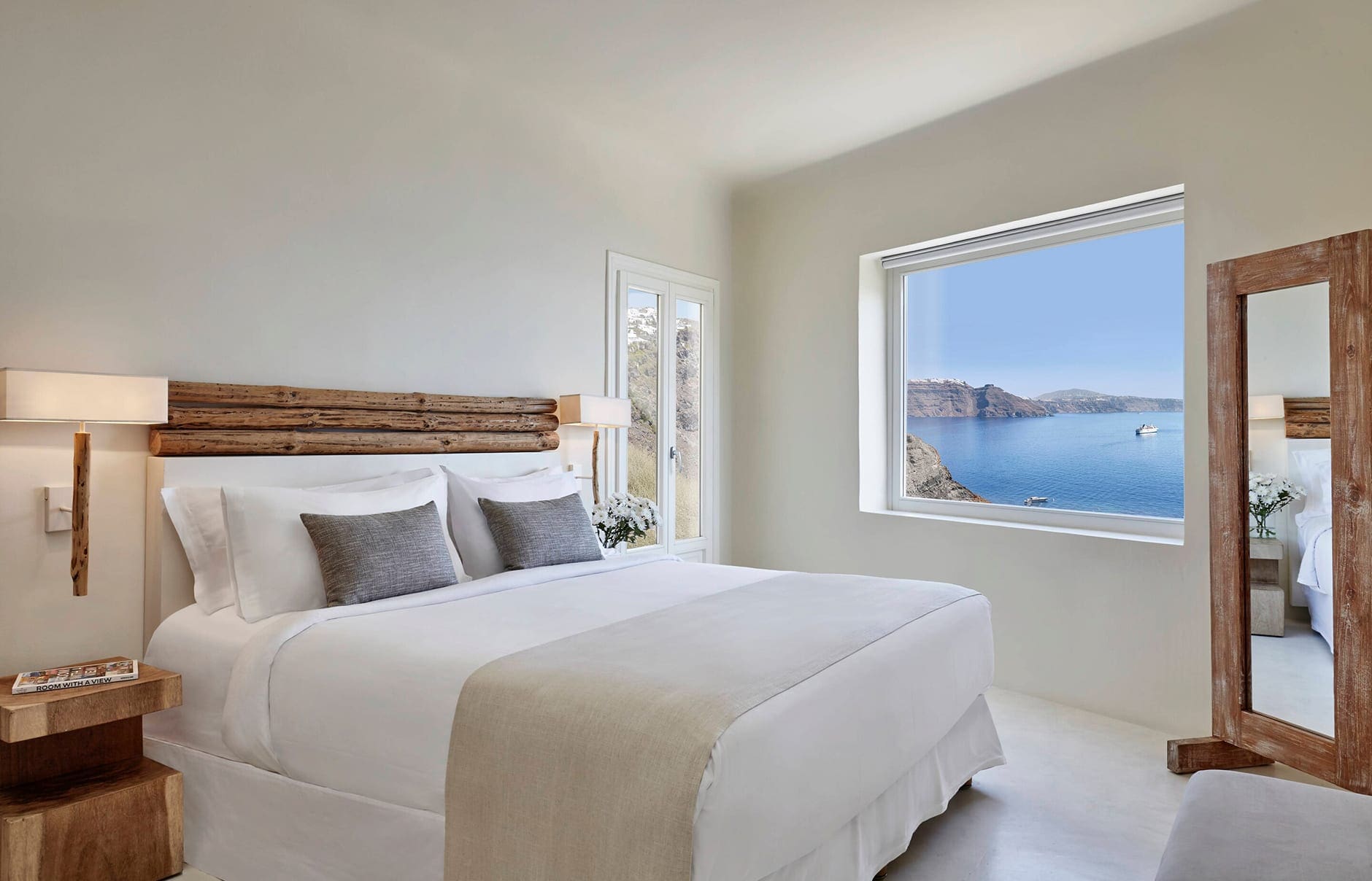 Mystique, Santorini, Greece. Hotel Review by TravelPlusStyle. Photo © Marriott International jtrml-villa-bedroom-3284-hor-clsc