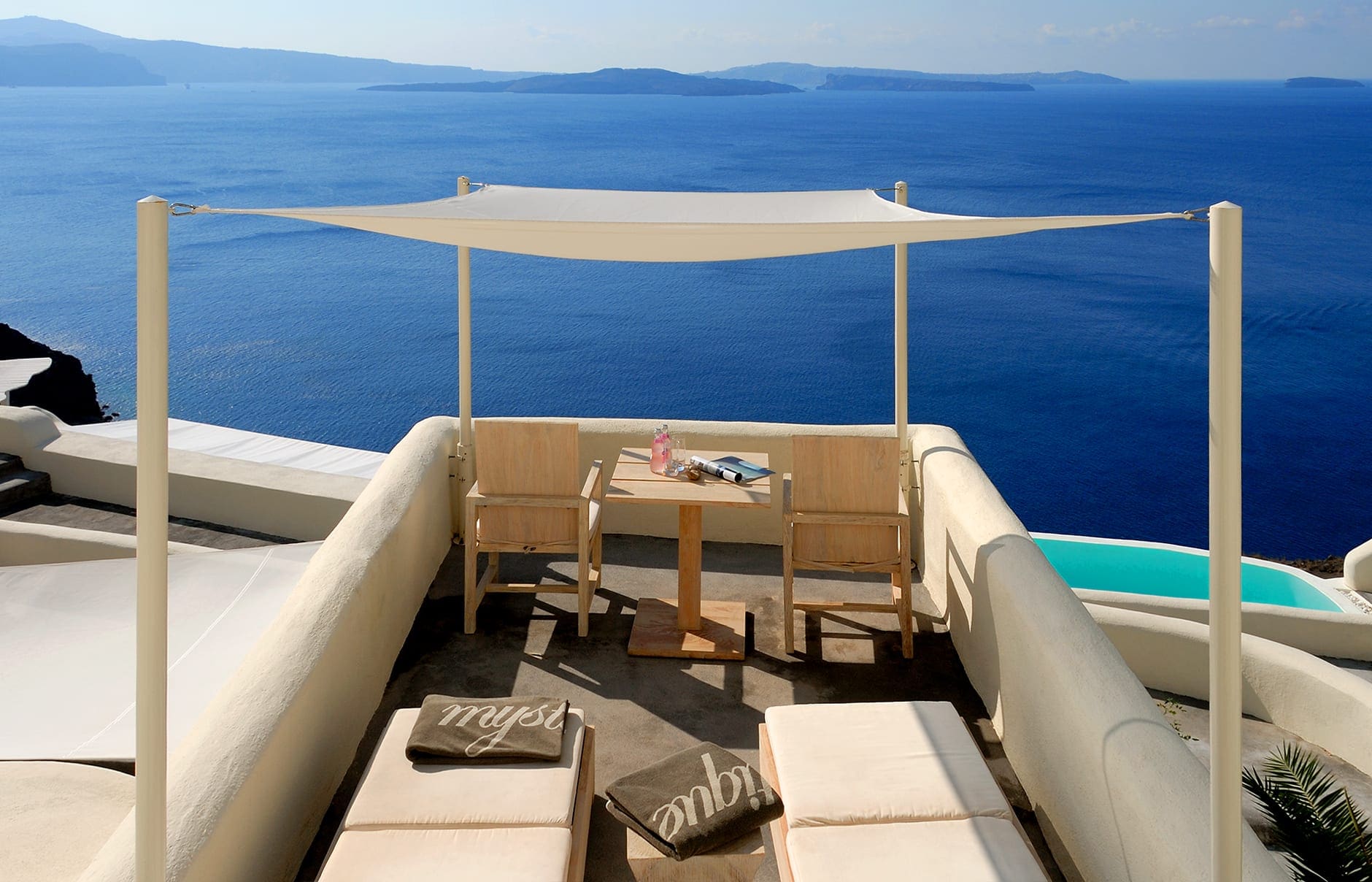 Mystique, Santorini, Greece. Hotel Review by TravelPlusStyle. Photo © Marriott International Vibrant suite. Mystique, Santorini. © Mystique Resort Santorini, Greece