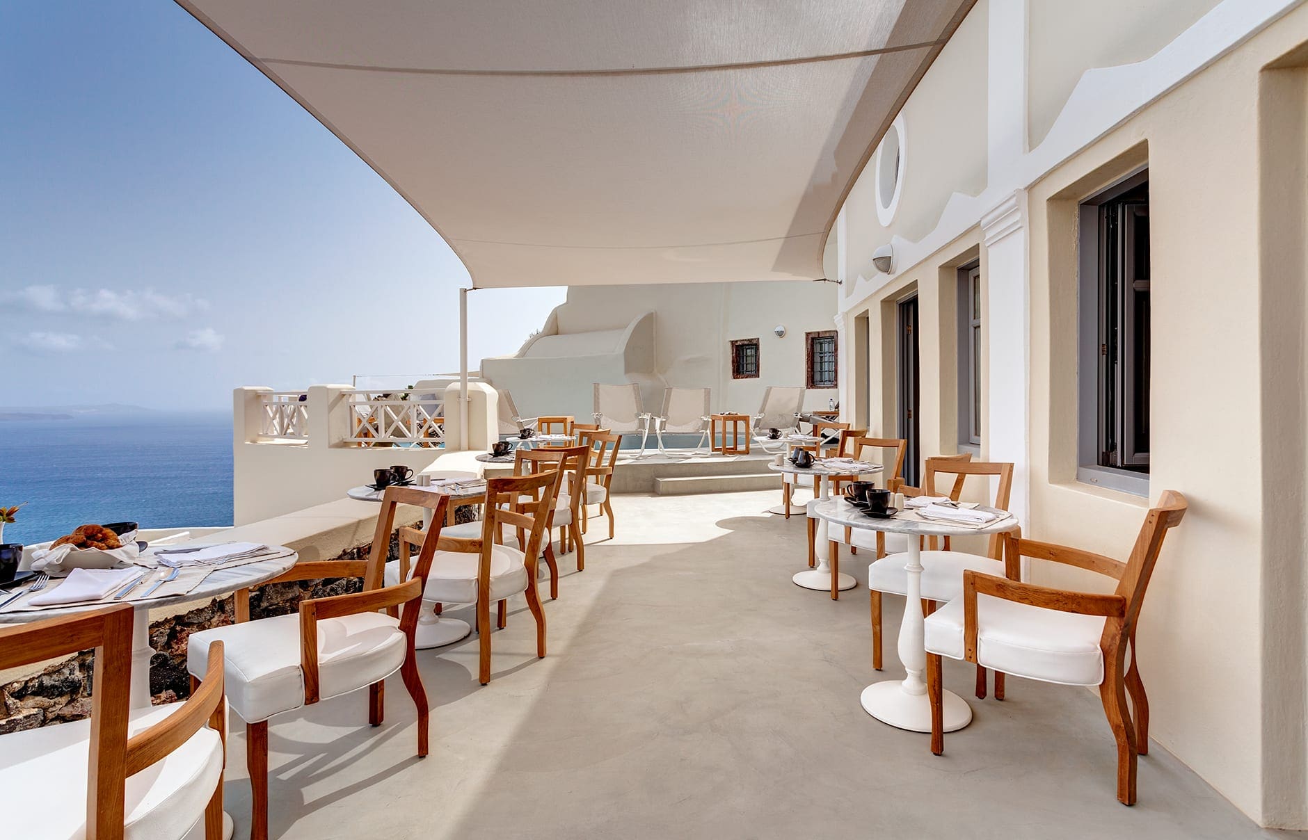 Mystique, Santorini, Greece. Hotel Review by TravelPlusStyle. Photo © Marriott International Mystique, Santorini. © Mystique Resort Santorini, Greece