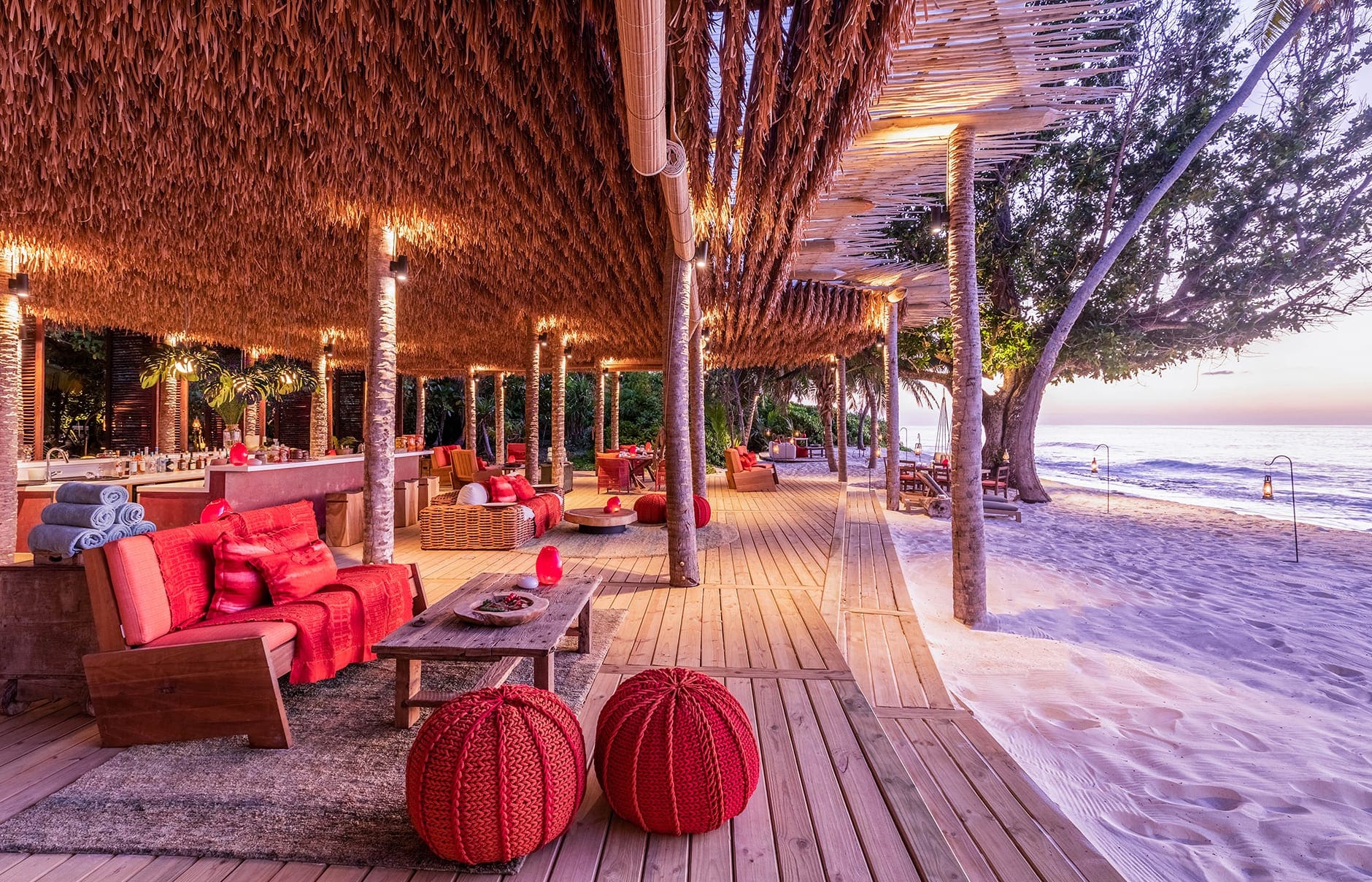 North Island, a Luxury Collection Resort, Seychelles. Luxury Hotel Review by TravelPlusStyle. Photo © North Island 115688007-h1-sezlc-west-beachbar-4064-hor-clsc