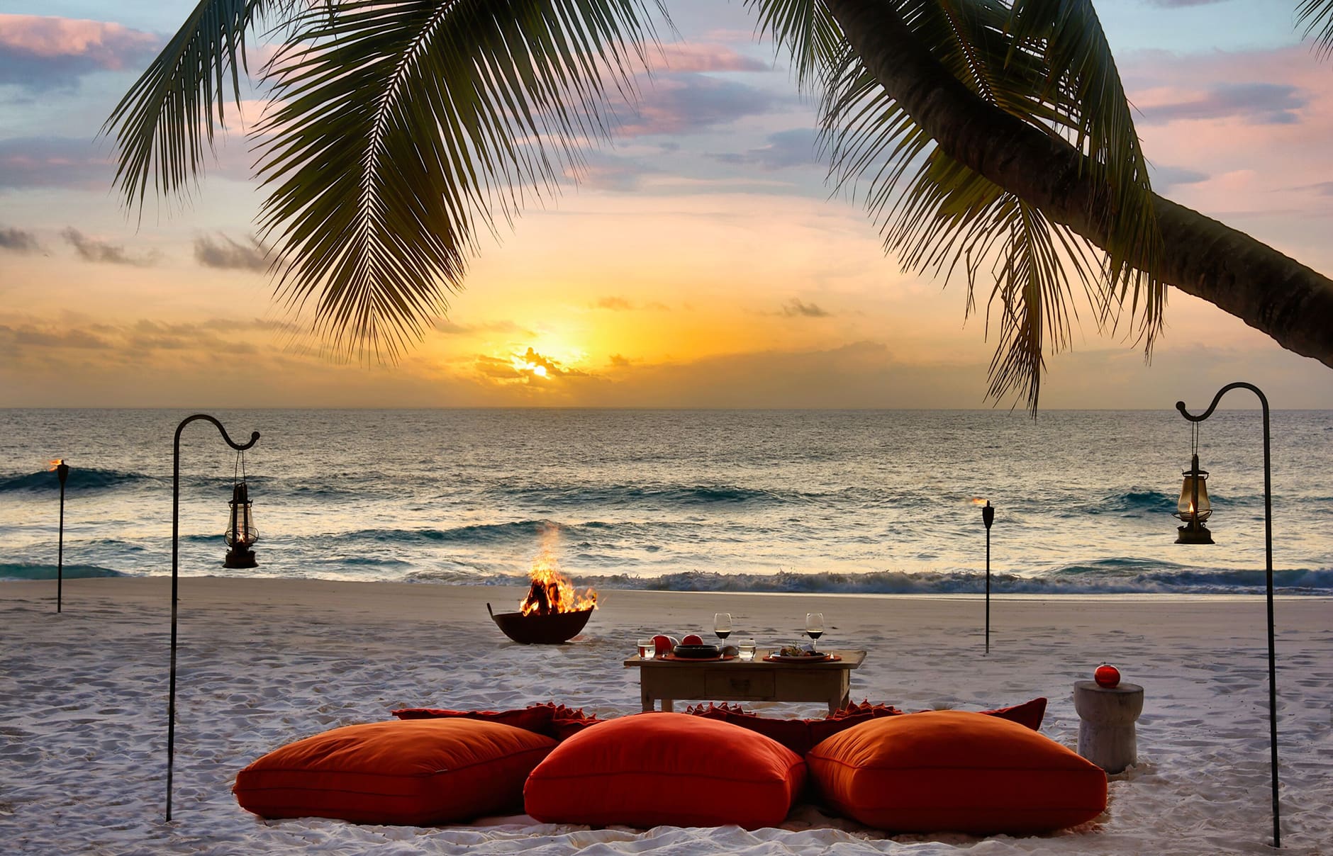 North Island, a Luxury Collection Resort, Seychelles. Luxury Hotel Review by TravelPlusStyle. Photo © North Island lc-sezlc-beach-sundowners-42092_classic-hor