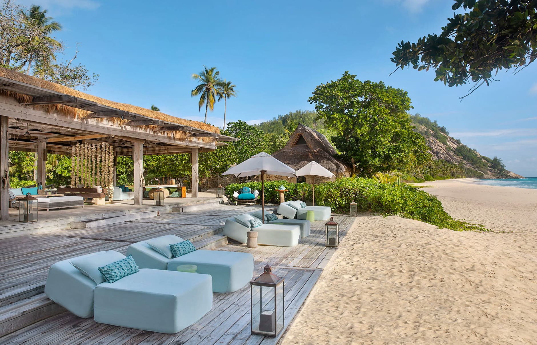 North Island, a Luxury Collection Resort, Seychelles. Luxury Hotel Review by TravelPlusStyle. Photo © North Island lc-sezlc-relax-on-piazza-beach-29162_classic-hor