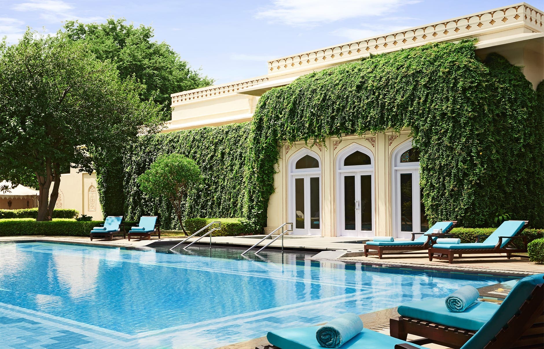 Taj Rambagh Palace, Jaipur, India. Luxury Hotel Review by TravelPlusStyle. Photo © Taj Hotels Resorts and Palaces hi_h4ej0_67917698_trpj_outdoor_pool1_9500